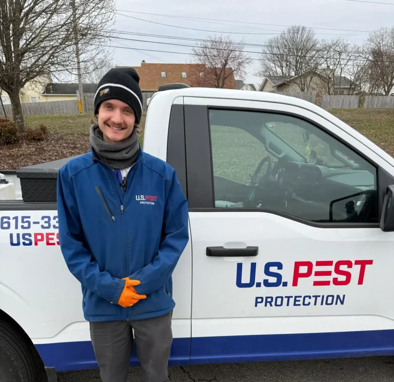 U.S. Pest Protection technician inspecting a Tennessee home for pest activity