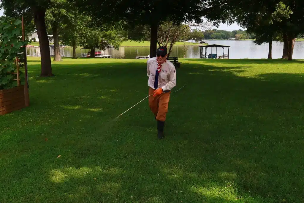 The Diagnosis Was Ehrlichiosis — Tennessee's Most Reported Tick Illness 5 U.S. Pest Protection technician treating a residential yard perimeter for lone star tick control